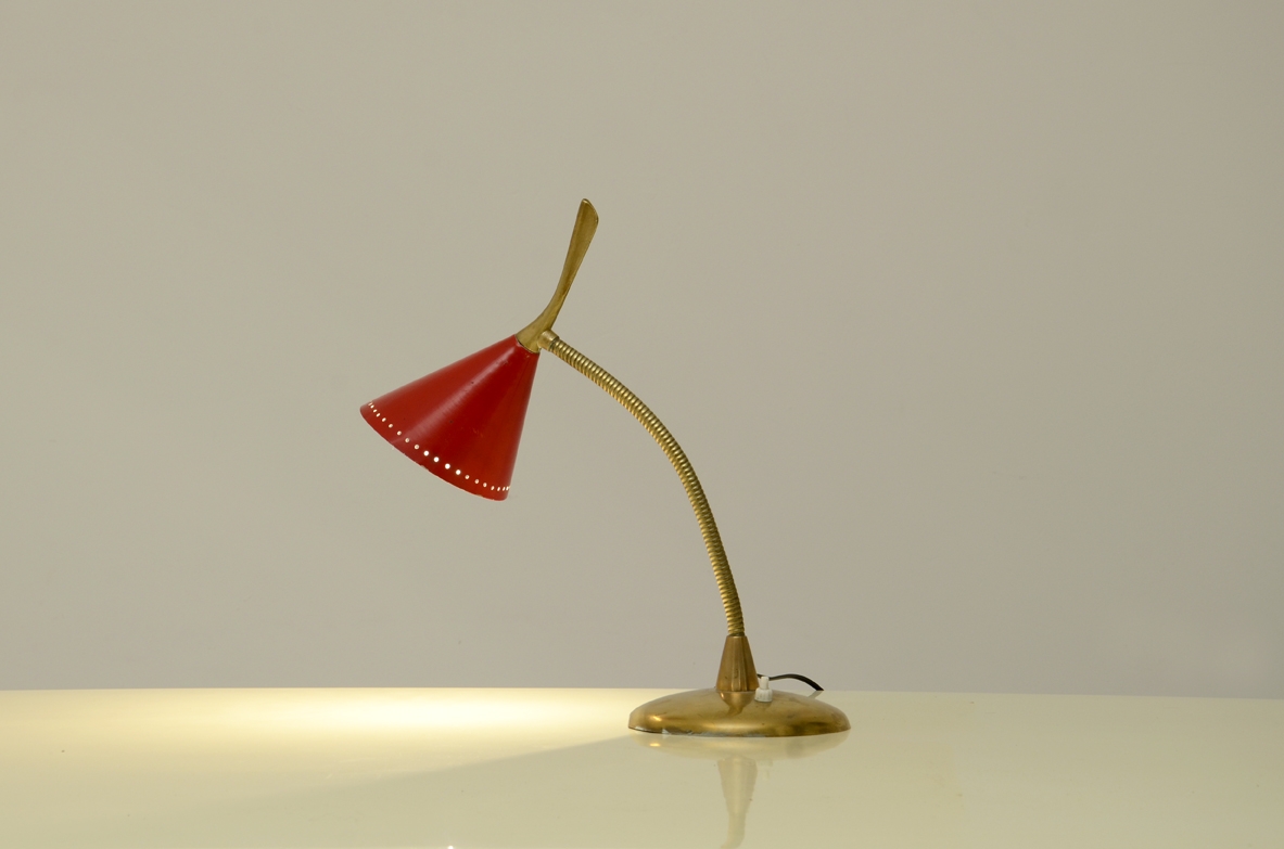 Adjustable table lamp in brass with red shade. Prod.Stilux 1950's.