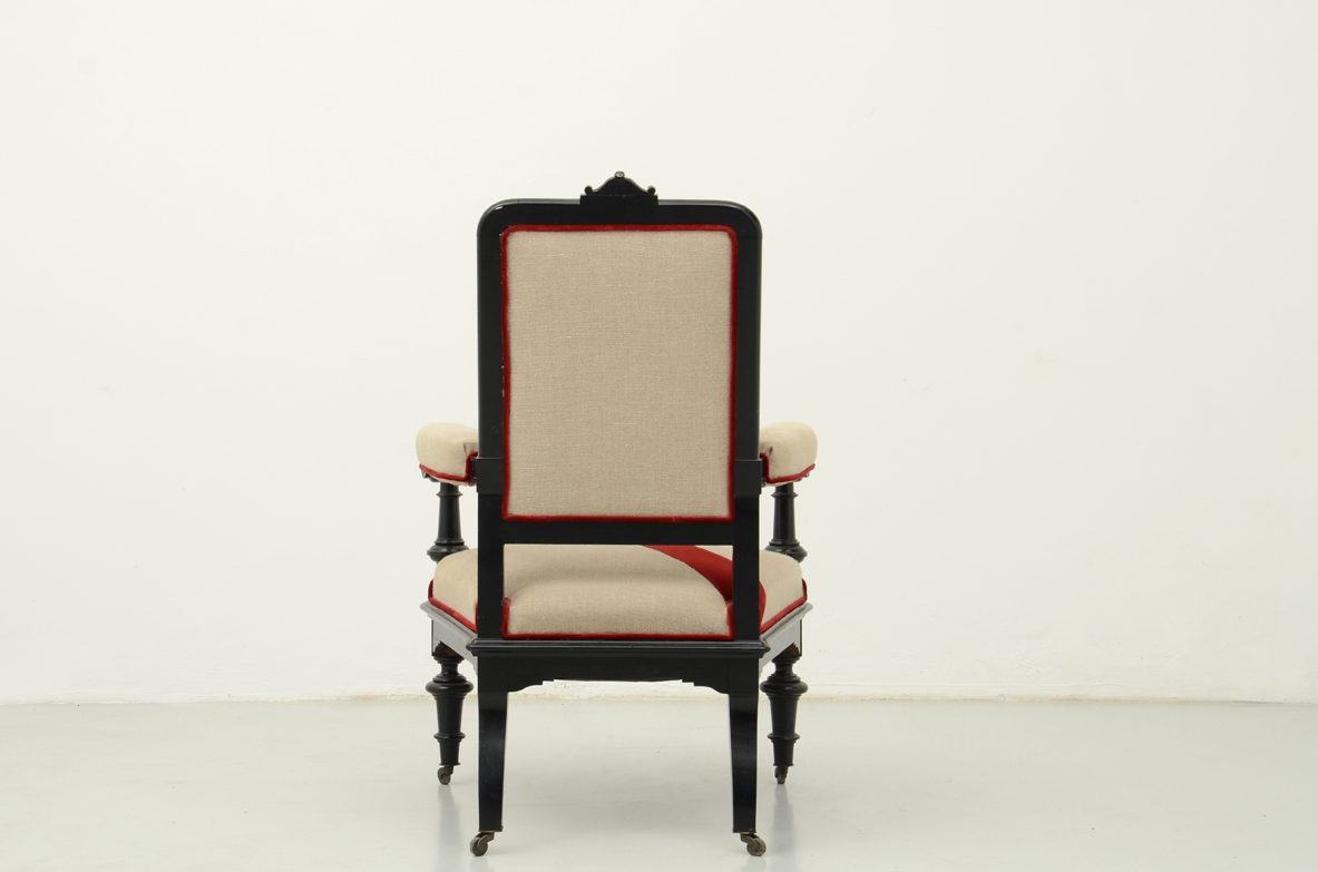 Beautiful 1880's Italian ebonized armchair with linen and velvet upholstery.