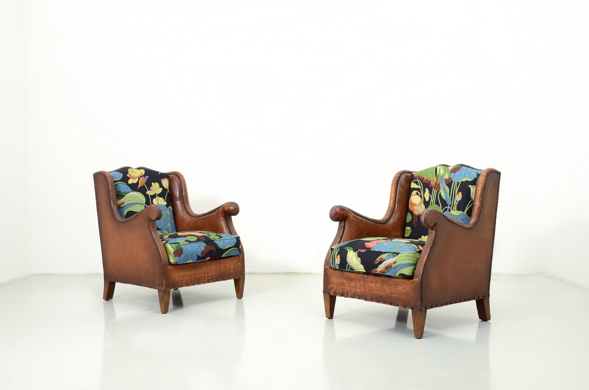 Pair of 1930's club armchairs.
