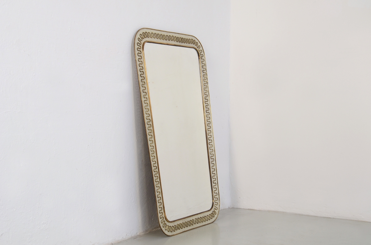 Carlo Erba, elegant 1950's mirror with metal and brass frame.