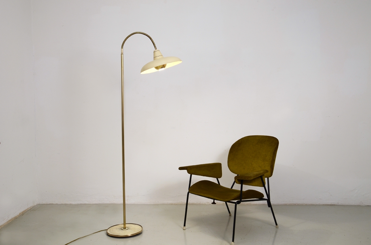 Italian 1950's adjustable floor lamp in metal and brass.