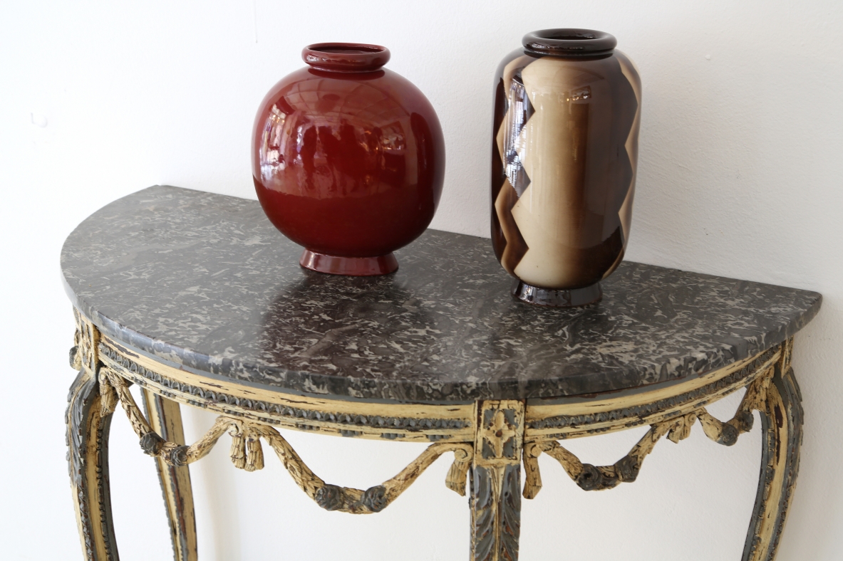 Luis XVI console table in painted thin carved wood, France 1770's.