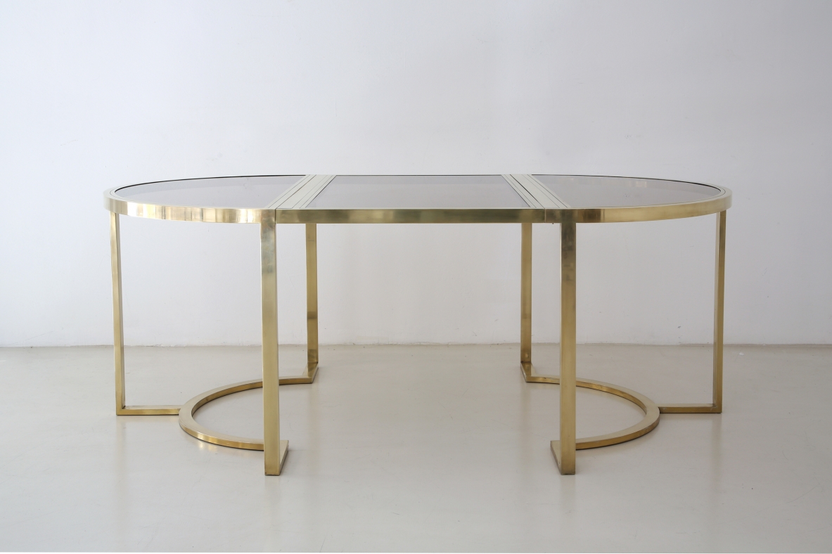 Romeo Rega, tavolo da pranzo in ottone con piano in cristallo brunito, 1970ca.