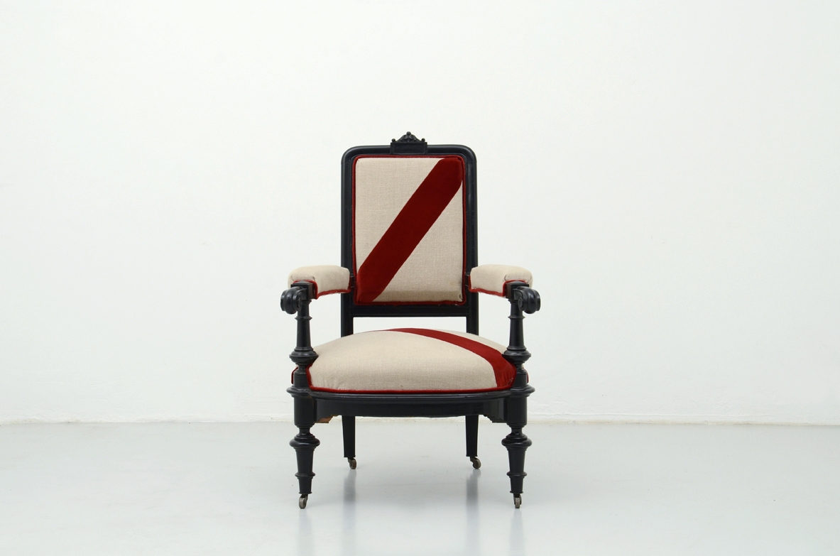 Beautiful 1880's Italian ebonized armchair with linen and velvet upholstery.