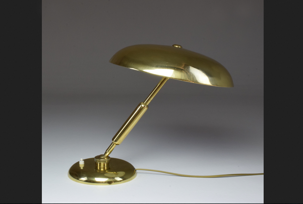 Italian adjustable 1940's table lamps in brass.
