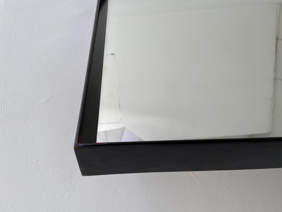 Italian 1940's mirror frame in polished wood.