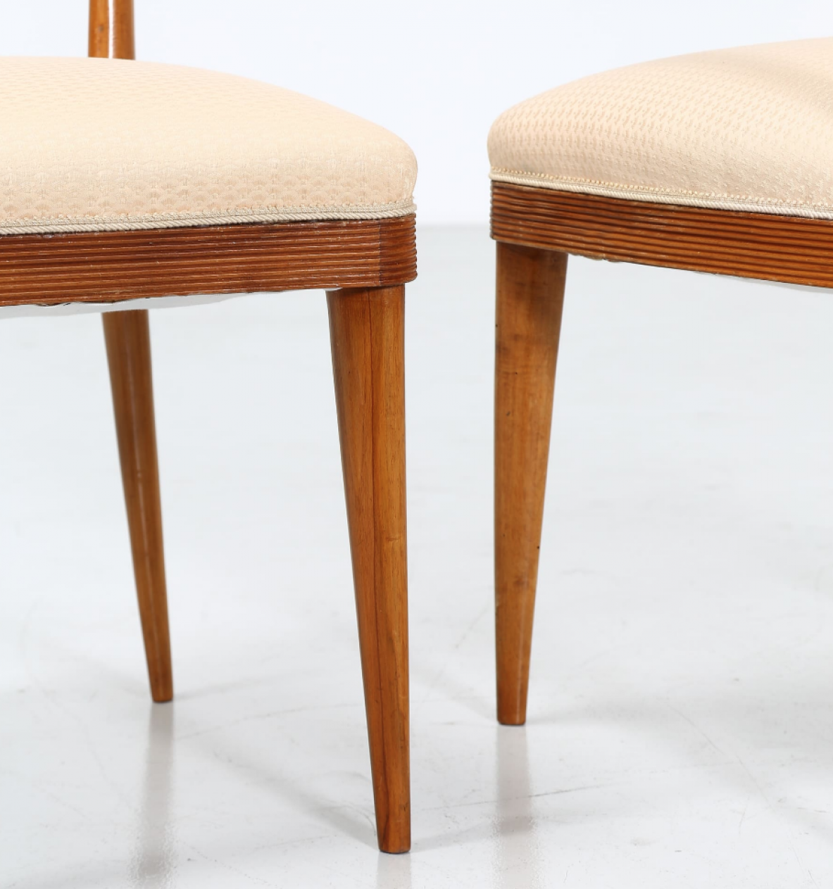 Group of six chairs in walnut wood with upholstered fabric seat