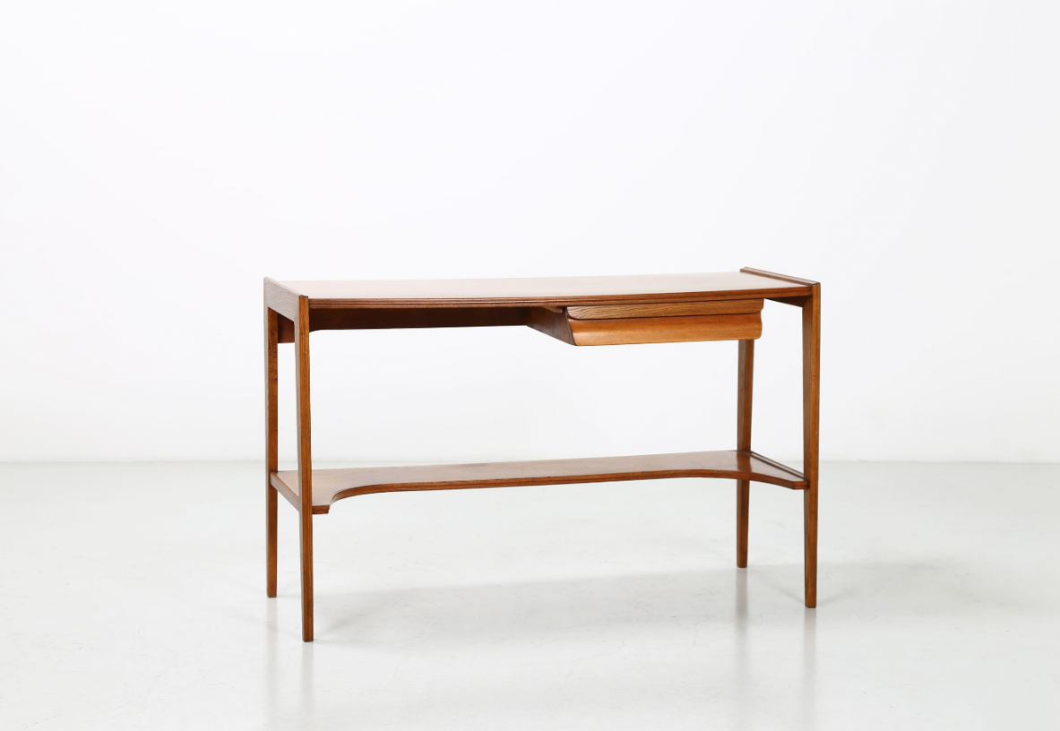 Console desk in wood with two shelves and drawer on one side. Italy, 1950's.
