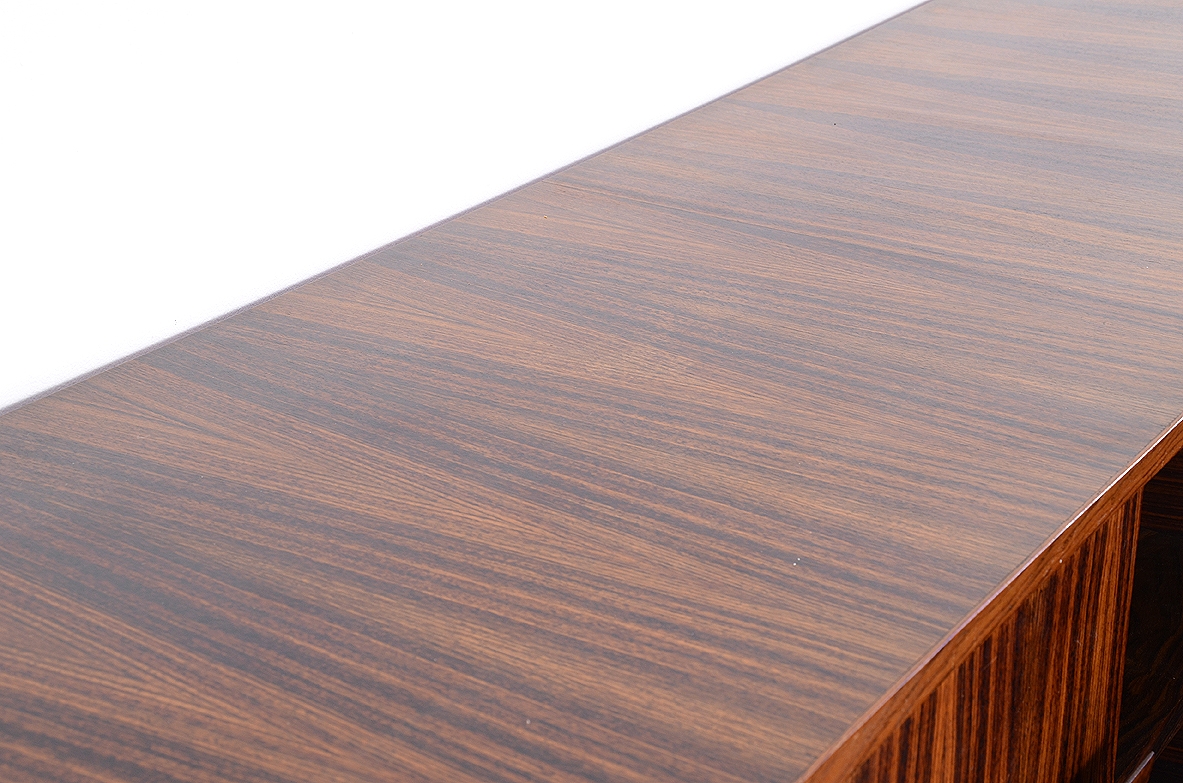 Splendid Italian 1960's sideboard in exotic wood with doors and drawers on both sides,