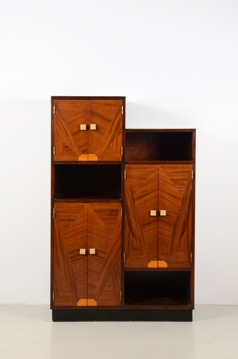 Italian 1930's cabinet with nice inlaid wood on his front doors and carved handles in bown. Rare example belonging to the "Italian rationalism" movement.