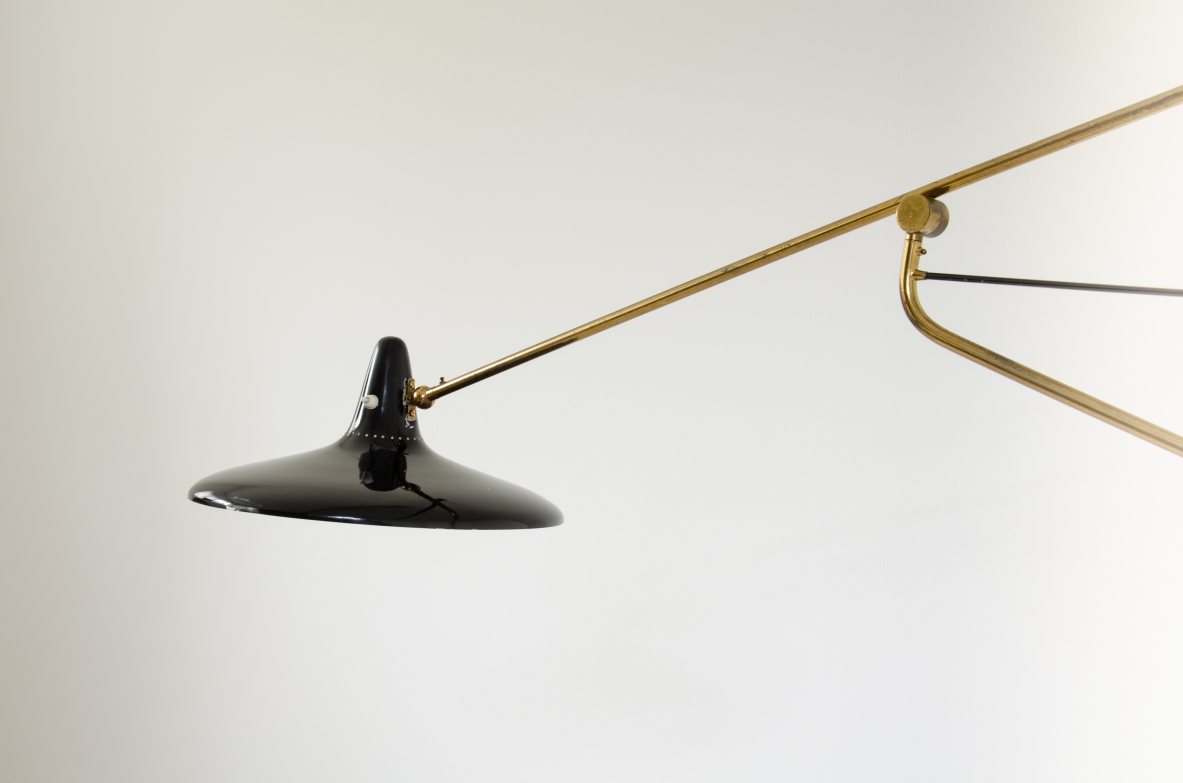 Stilnovo, rare 1950's adjustable wall light in painted metal and brass.  Stamp of the manufacturer.