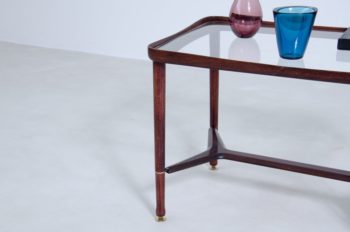 Ico Parisi, 1950's coffee table in mahogany with brass details and glass top.