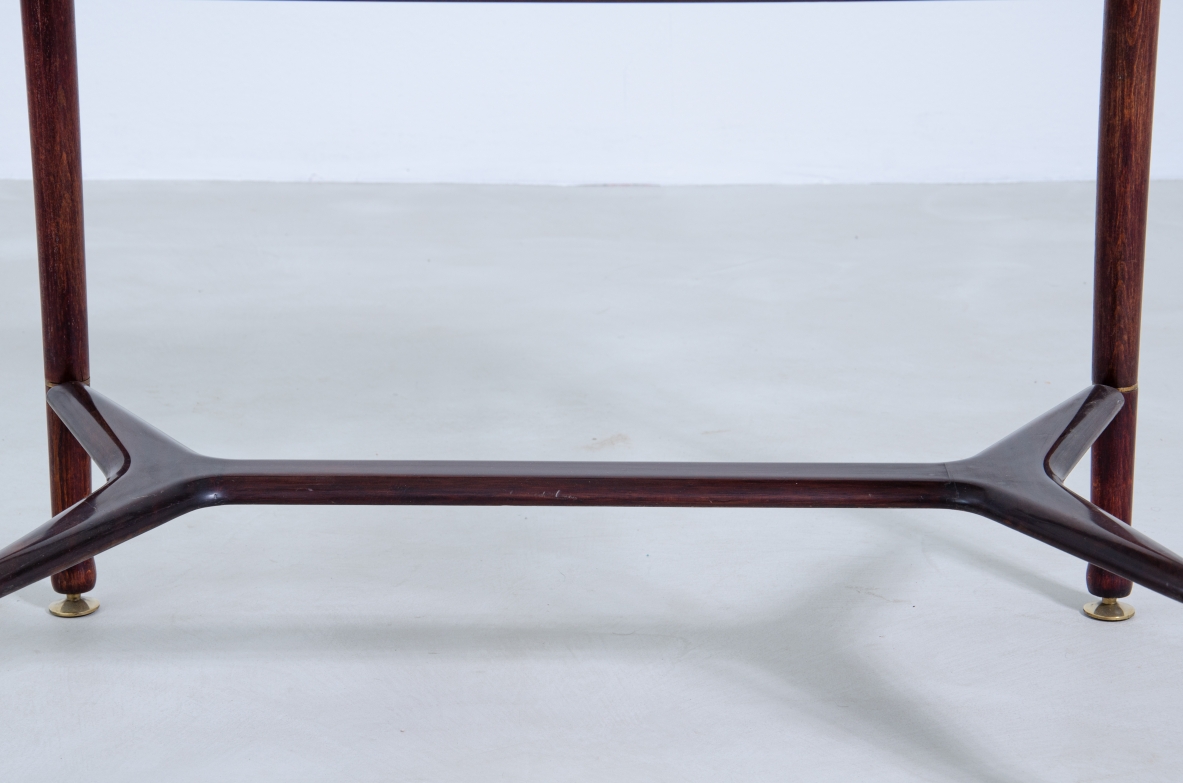 Ico Parisi, 1950's coffee table in mahogany with brass details and glass top.
