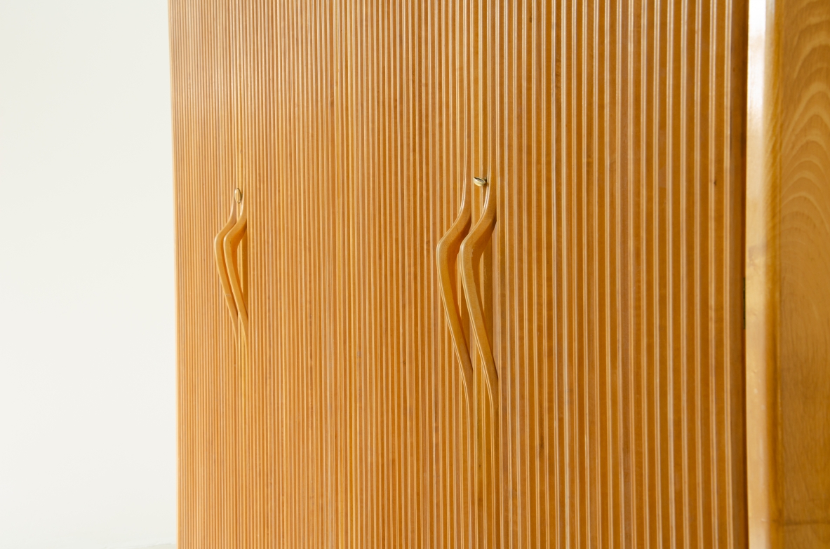 Four-door wardrobe in blond maplewood, Produced by Cassina, 1957.
