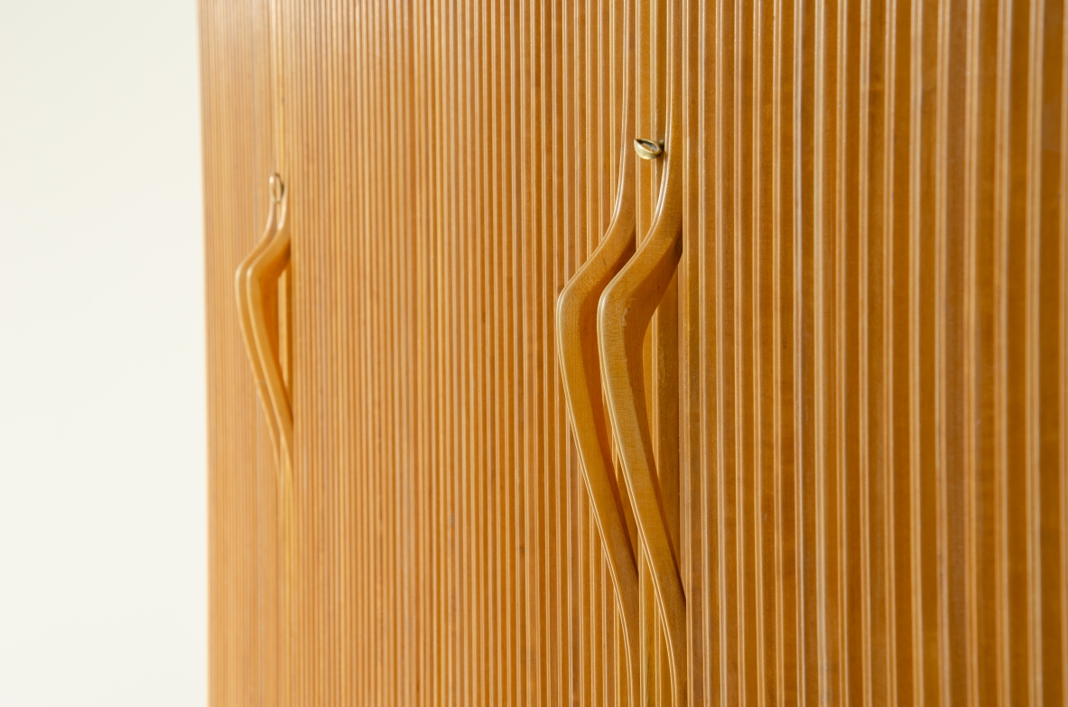 Four-door wardrobe in blond maplewood, Produced by Cassina, 1957.