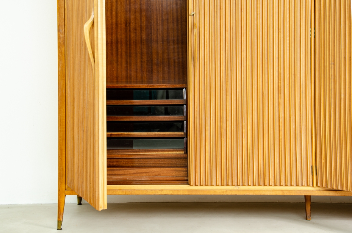 Four-door wardrobe in blond maplewood, Produced by Cassina, 1957.