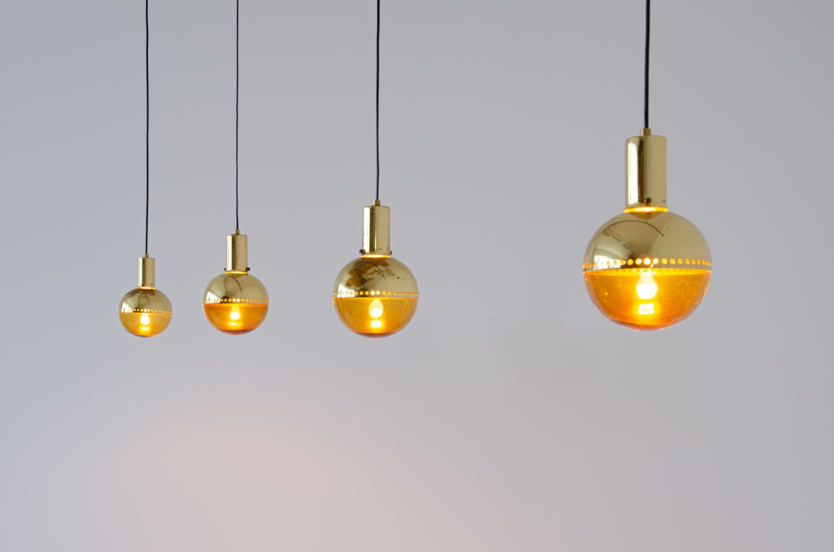 Hans A. Jacobsson, set of four pending lamps in brass and blown glass.  Prod. Haj, Stockholm Sweden, 1960s.