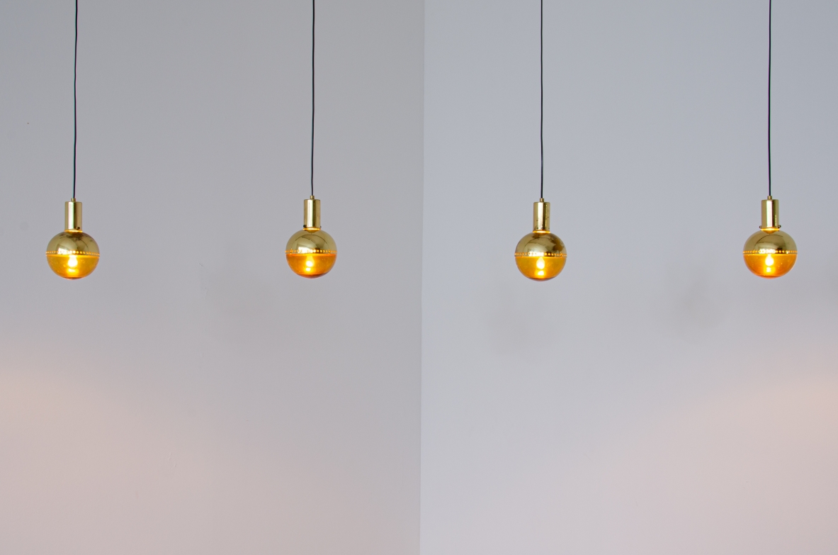 Hans A. Jacobsson, set of four pending lamps in brass and blown glass.  Prod. Haj, Stockholm Sweden, 1960s.
