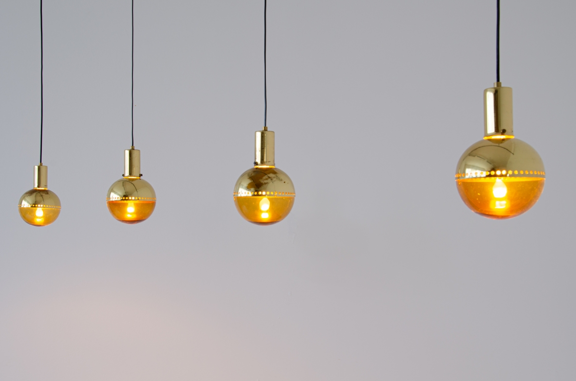 Hans A. Jacobsson, set of four pending lamps in brass and blown glass.  Prod. Haj, Stockholm Sweden, 1960s.