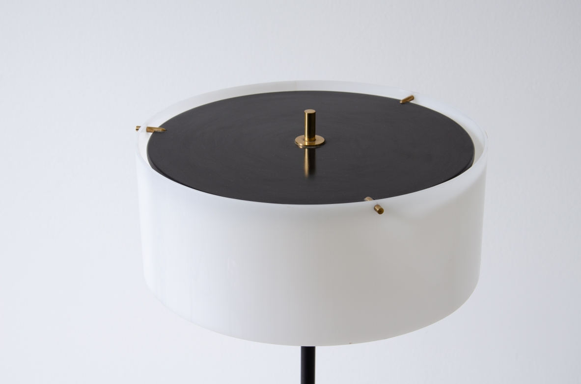 Tito Agnoli, metal and brass floor lamp with marble base and black and white methacrylate hat.  Produced by Oluce 1955.