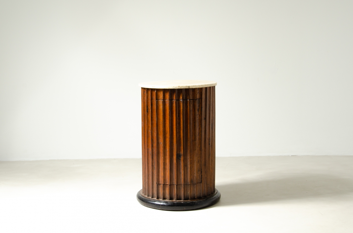 Column in fluted walnut with door and top in marble.  Italian manufacture, late Empire period, around 1830s.