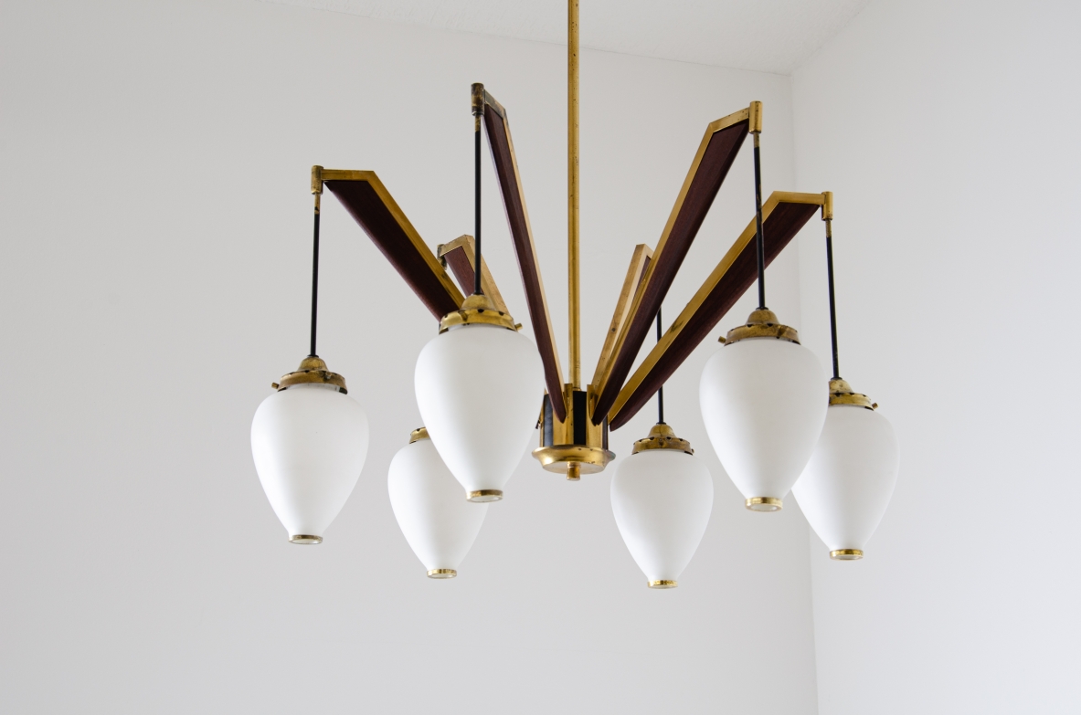 Stilnovo, six-light chandelier with drop-shaped opaline glass diffusers with brass ends.
