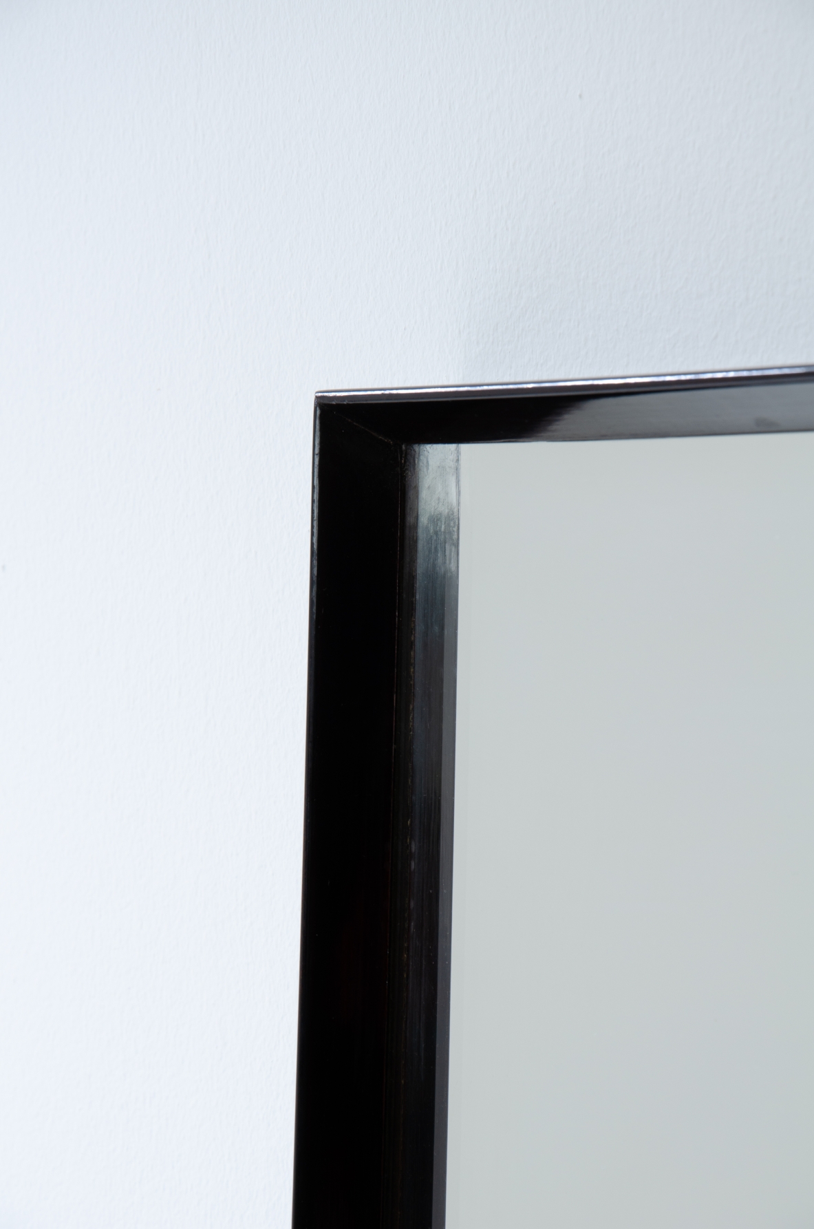 Italian 1940's mirror frame in polished wood.
