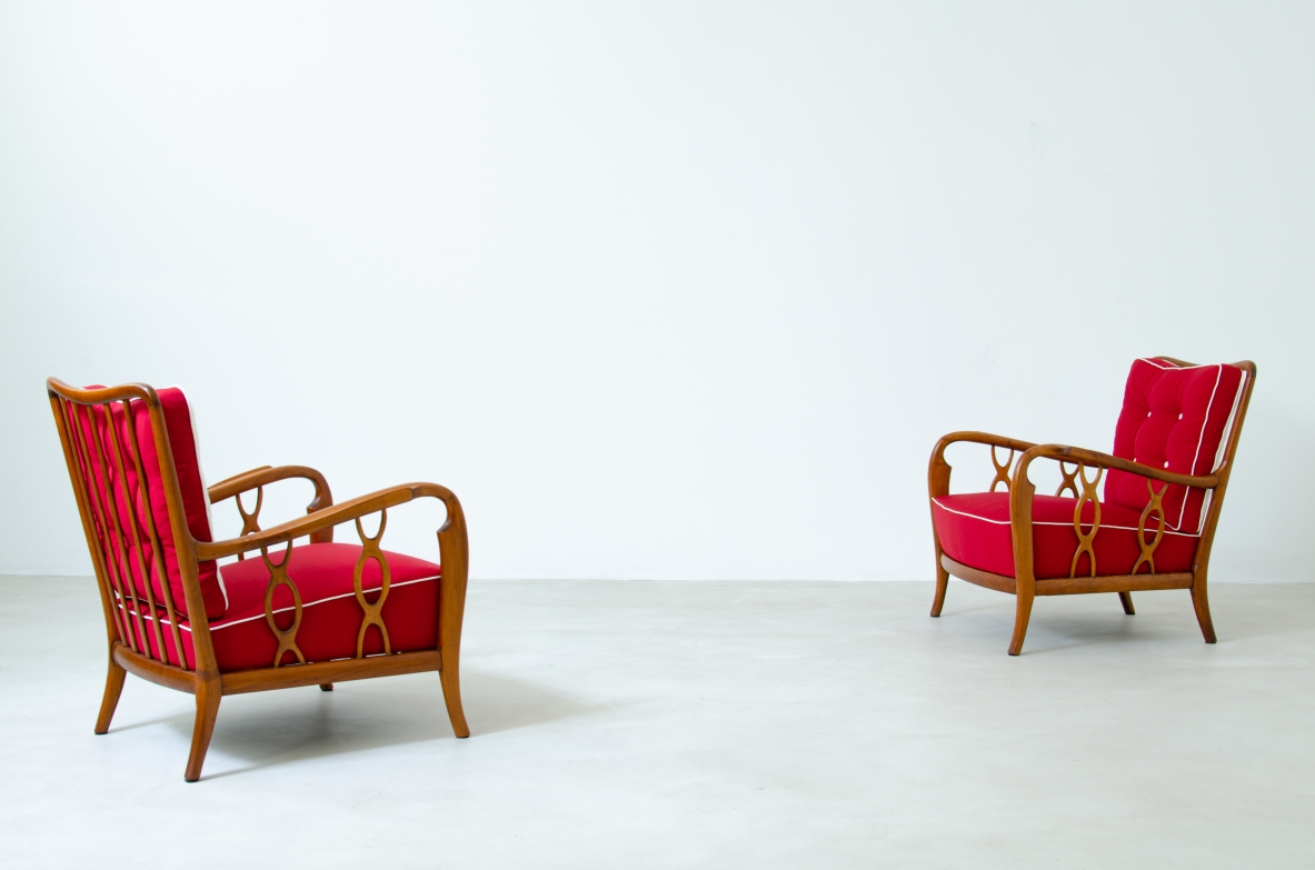 Pair of cherry wood armchairs with ribbon motif on the sides. Seat and back in padded fabric.  Attribution Paolo Buffa 1930s.