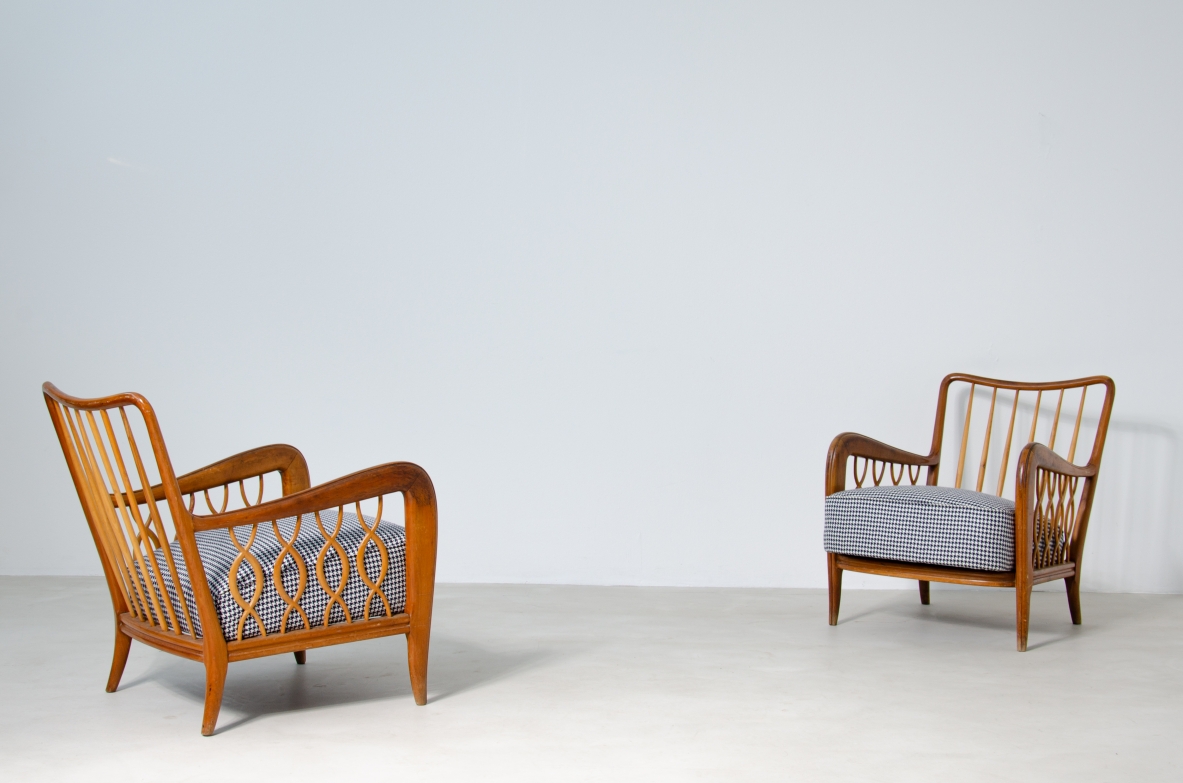 Paolo Buffa (1903 - 1970)  Pair of rare armchairs with ribbon motif in oak wood and upholstered fabric.  Italy, 1940's.