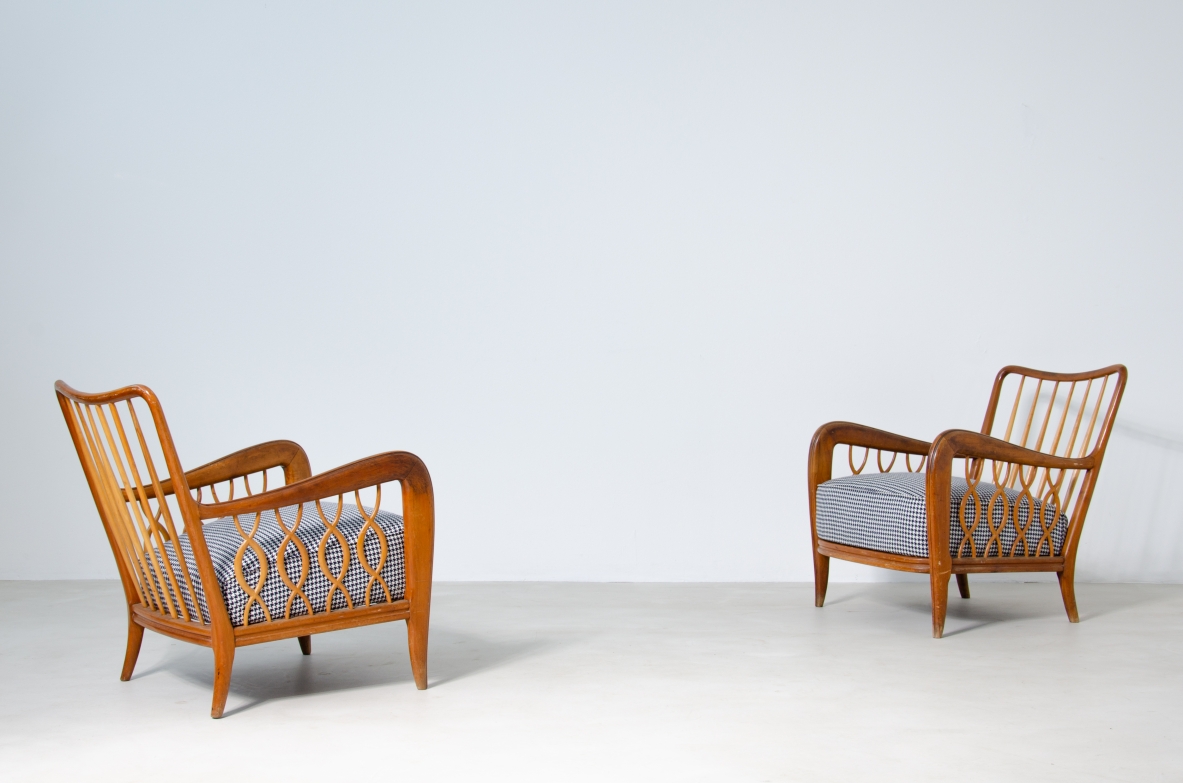 Paolo Buffa (1903 - 1970)  Pair of rare armchairs with ribbon motif in oak wood and upholstered fabric.  Italy, 1940's.