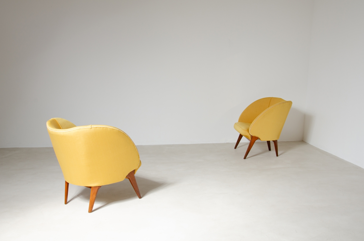 Federico Munari, pair of armchairs with sculptural shaped back.  Italian manufacture, 1950s.