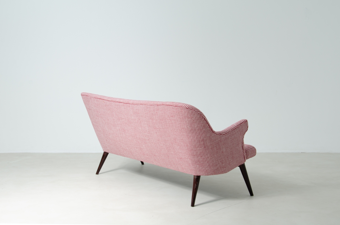 Osvaldo Borsani (1911-1985)  Sofa covered in fabric with long turned wooden feet.  Manifactured by ABV.  Borsani, Varedo, 1950s.