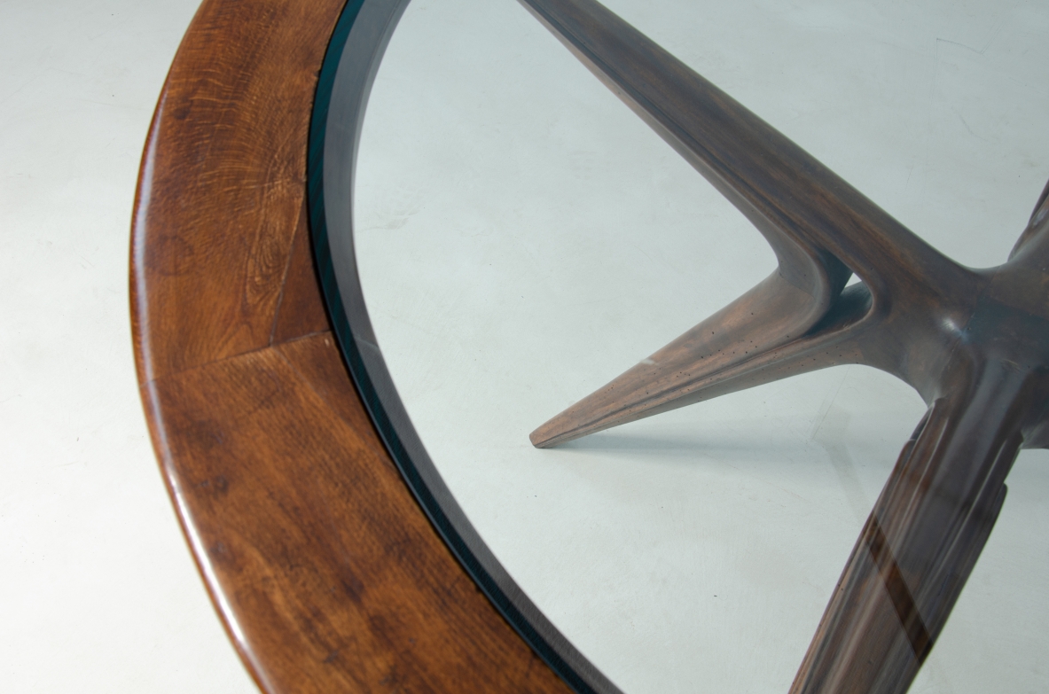 Gianni Vigorelli round table in wood and thick glass, 1950s.