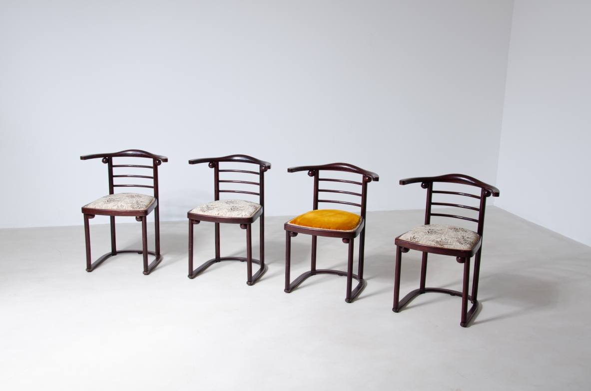 Josef Hoffmann (1870-1956)  Rare set of four chairs in curved polished wood and upholstered seat.  Manufactured by JJ.Kohn, Vienna, 1907.