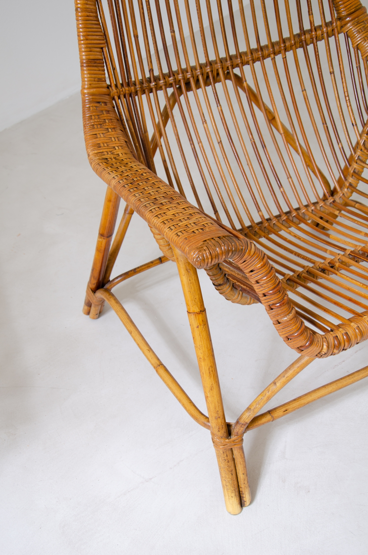 Pair of outdoor lounge chairs in wicker and bamboo.  Italian manufacture, 1950s.