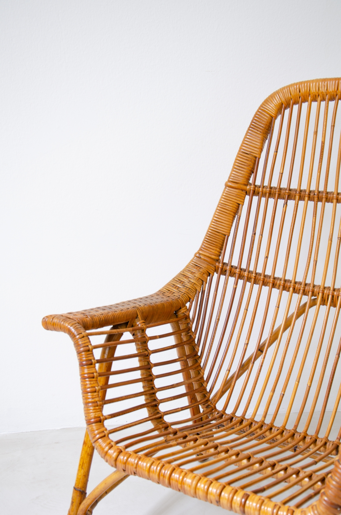 Pair of outdoor lounge chairs in wicker and bamboo.  Italian manufacture, 1950s.