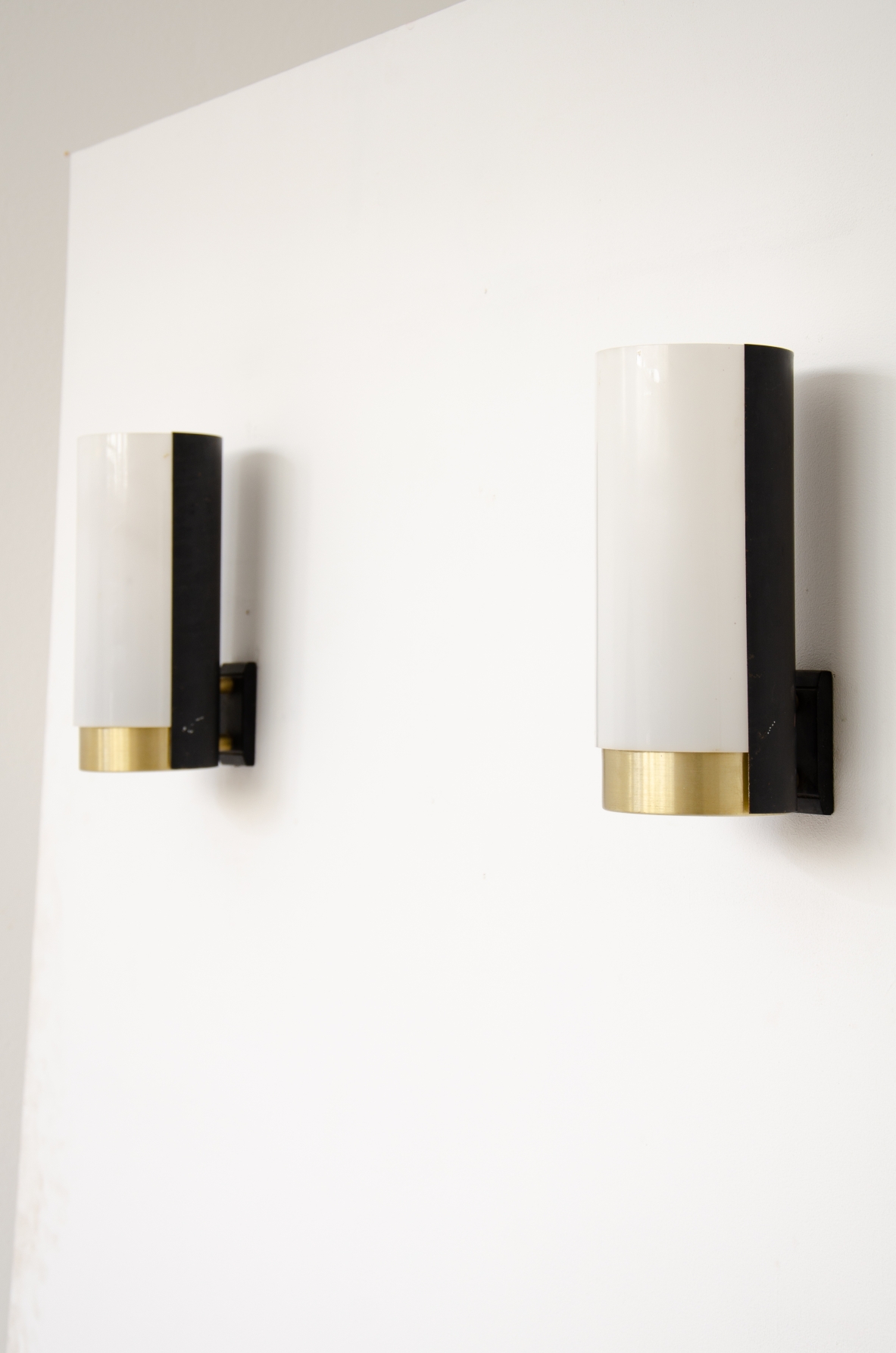 Pair of metal and brass wall lights with curved perplex shade.  Stilux Milan manufacture, 1960's.