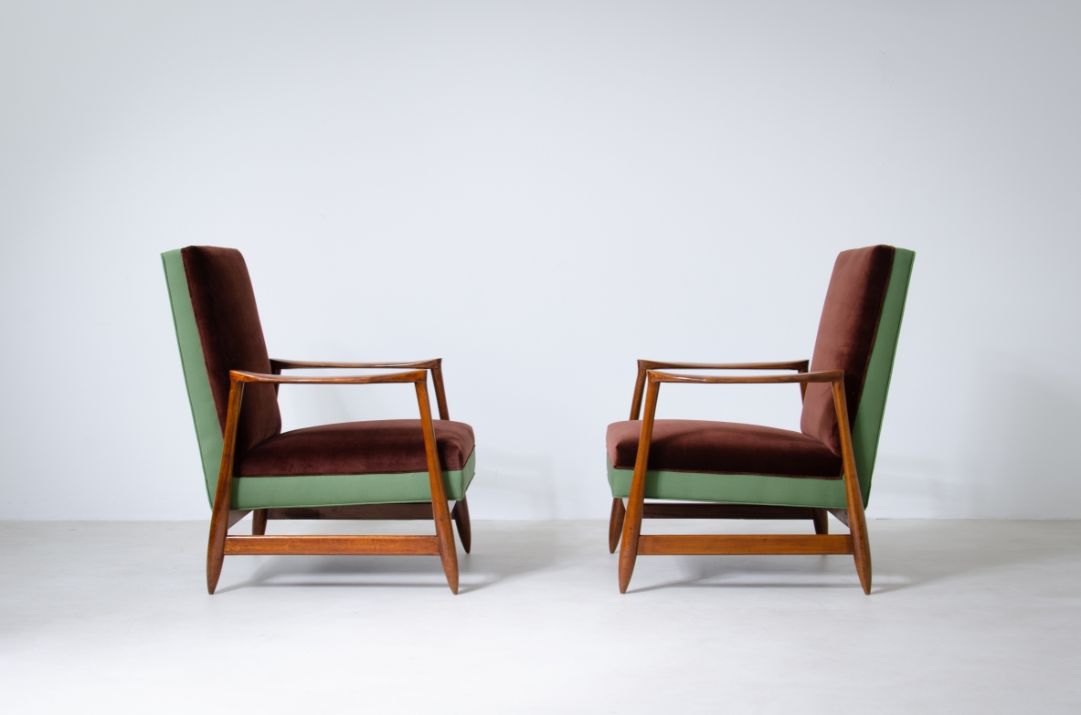 Pair of very elegant armchairs with wooden structure and upholstered fabric.  Italian manufacture, 1960's.