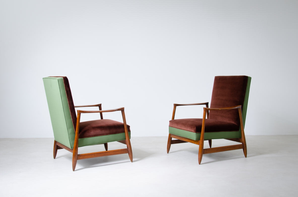 Pair of very elegant armchairs with wooden structure and upholstered fabric.  Italian manufacture, 1960's.