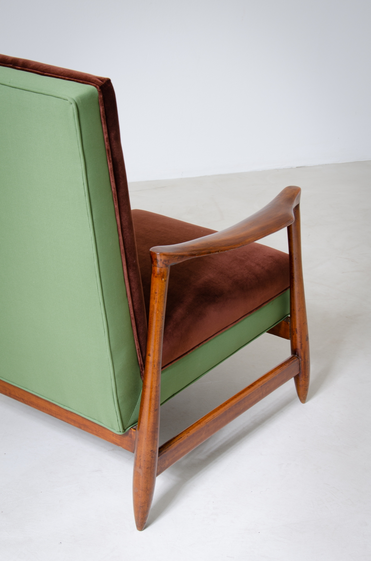 Pair of very elegant armchairs with wooden structure and upholstered fabric.  Italian manufacture, 1960's.