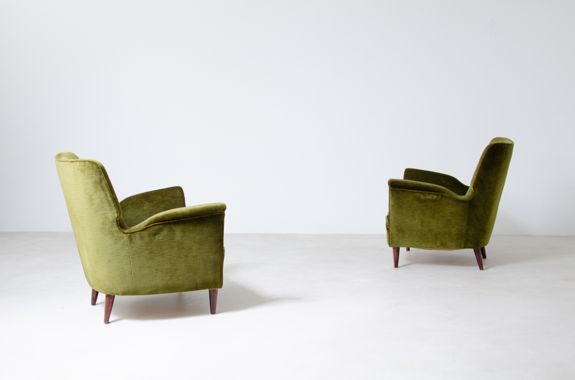 Pair of mid century modern armchairs upholstered in velvet.  1950's Italian manufacture.