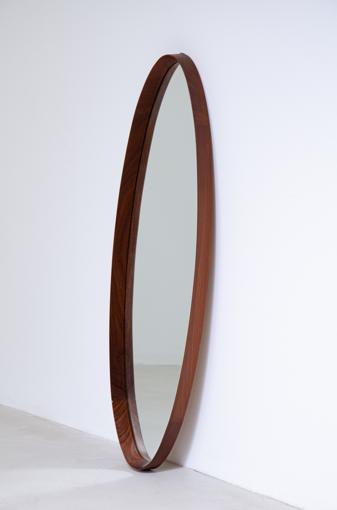 Elliptical shaped mirror in teak.  Denmark, 1960s