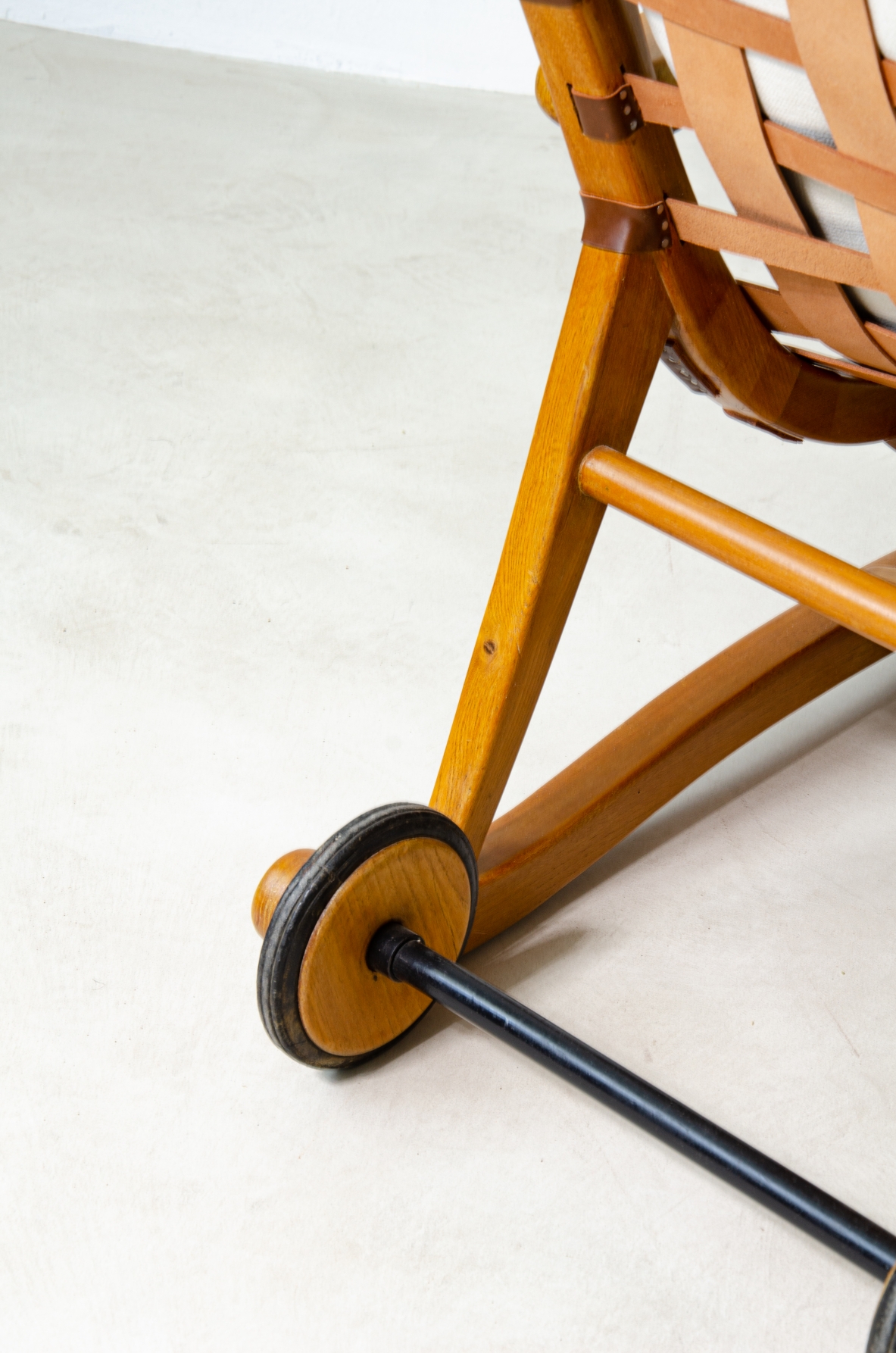 Guglielmo Pecorini. Rare pair of armchairs with rear wheels, coming from the Giulio Cesare ocean liner.