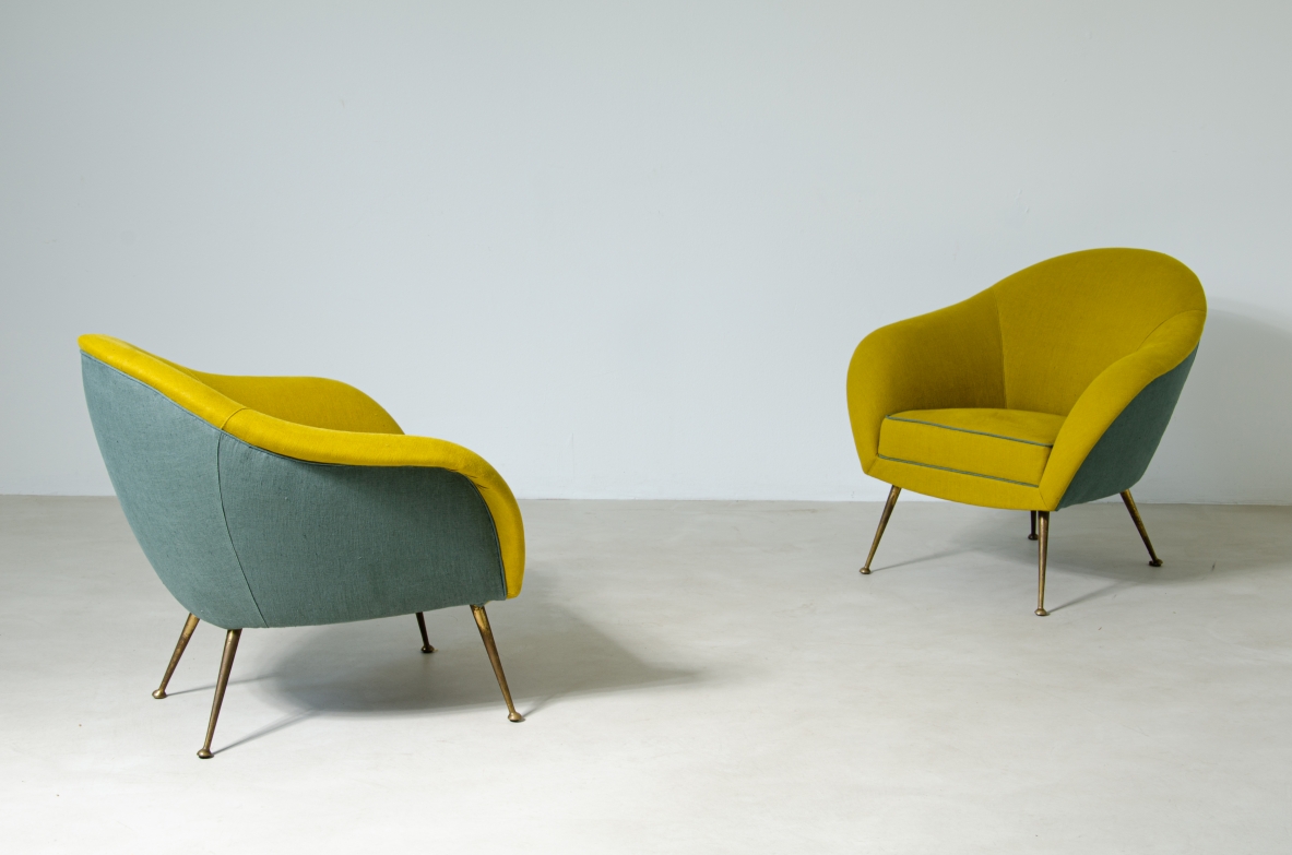 Pair of armchairs with linen upholstery and original burnished brass legs. 1950's Italian manufacture.