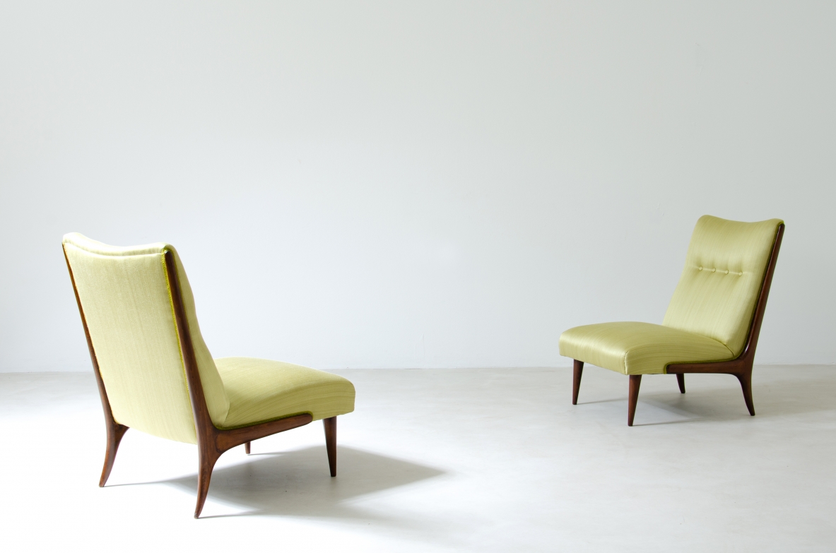 Pair of refined armchairs in polished wood with upholstered seat and back.  1950's Italian manufacture.