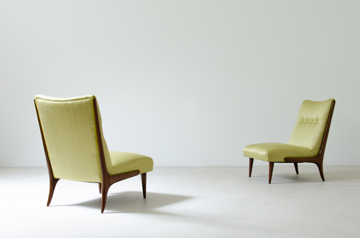 Pair of refined armchairs in polished wood with upholstered seat and back.  1950's Italian manufacture.