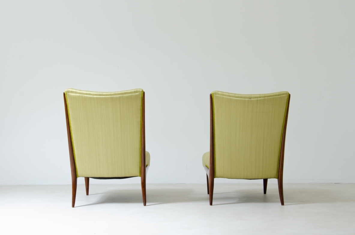Pair of refined armchairs in polished wood with upholstered seat and back.  1950's Italian manufacture.