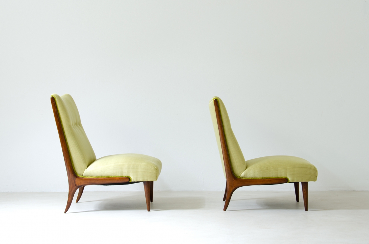 Pair of refined armchairs in polished wood with upholstered seat and back.  1950's Italian manufacture.