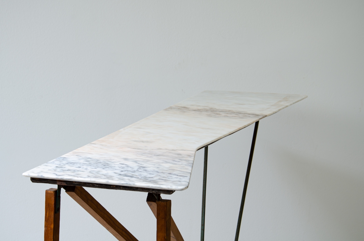 Console table with wooden structure, metal supports and irregular-shaped marble top. Italian manufacture, 1950's.