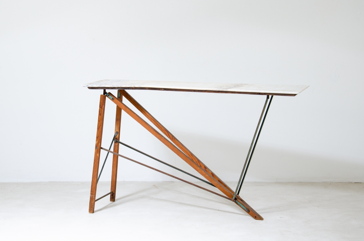 Console table with wooden structure, metal supports and irregular-shaped marble top. Italian manufacture, 1950's.